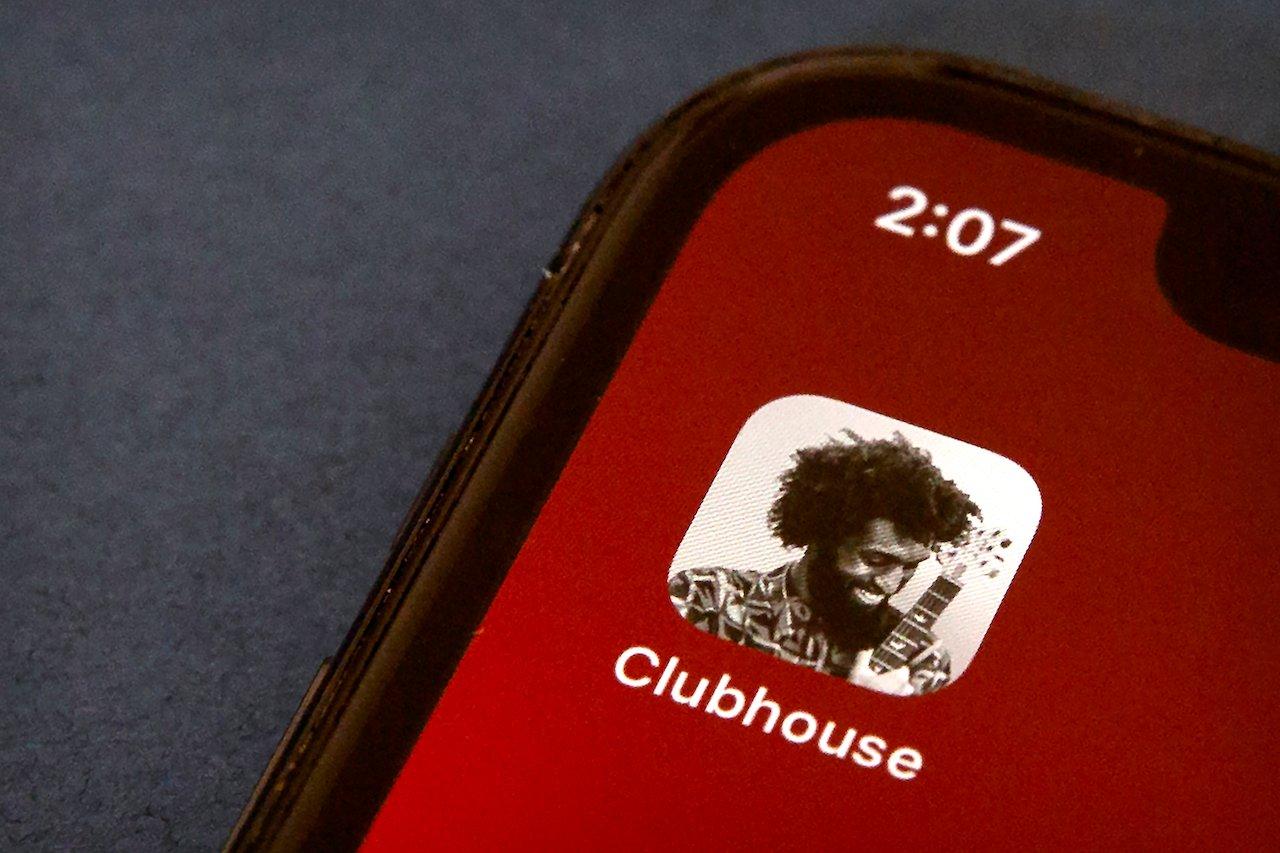The icon for the social media app Clubhouse is seen on a smartphone screen in Beijing, Feb 9. The app creates audio chatrooms in which users can listen to live conferences, but only if they have already been invited to join the platform by current members. Photo: AP