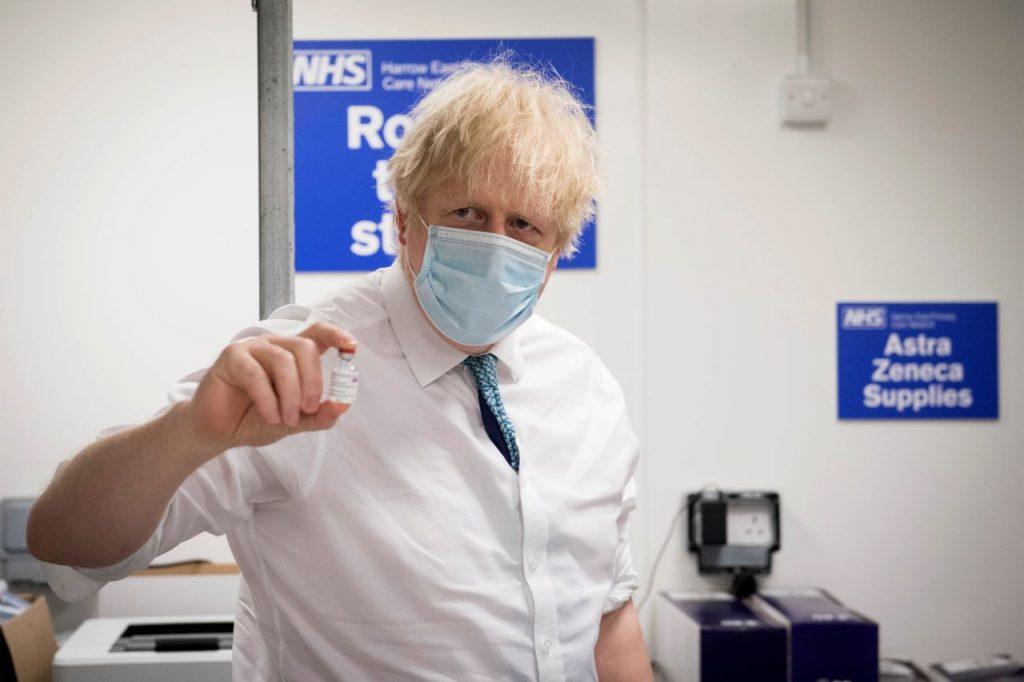 Britain's Prime Minister Boris Johnson holds a vial of the Oxford AstraZeneca Covid-19 vaccine on Jan 25. As part of Britain's presidency of G7 nations, Johnson wants to lead efforts on a global approach to pandemics, including an early warning system. Photo: AP