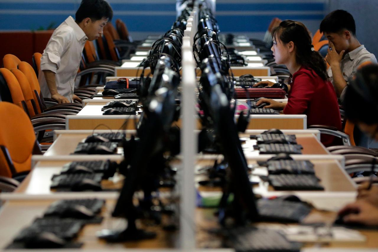 North Koreans use computer terminals at the Sci-Tech Complex in Pyongyang, North Korea. June 16, 2017. North Korean hackers attempted to steal information about coronavirus vaccines and treatments, South Korea's intelligence service said yesterday. Photo: AP