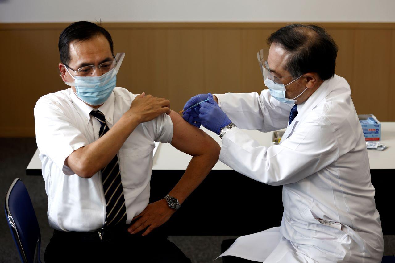 Tokyo Medical Centre director Kazuhiro Araki, the first to receive the Pfizer/BioNTech vaccine at the facility today. Photo: AP