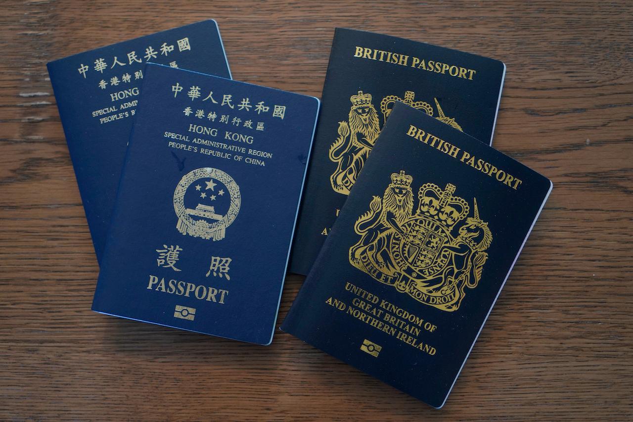 British National Overseas passports and Hong Kong passports displayed together. China has said it no longer recognises the BNO passport as a valid travel document. Photo: AP