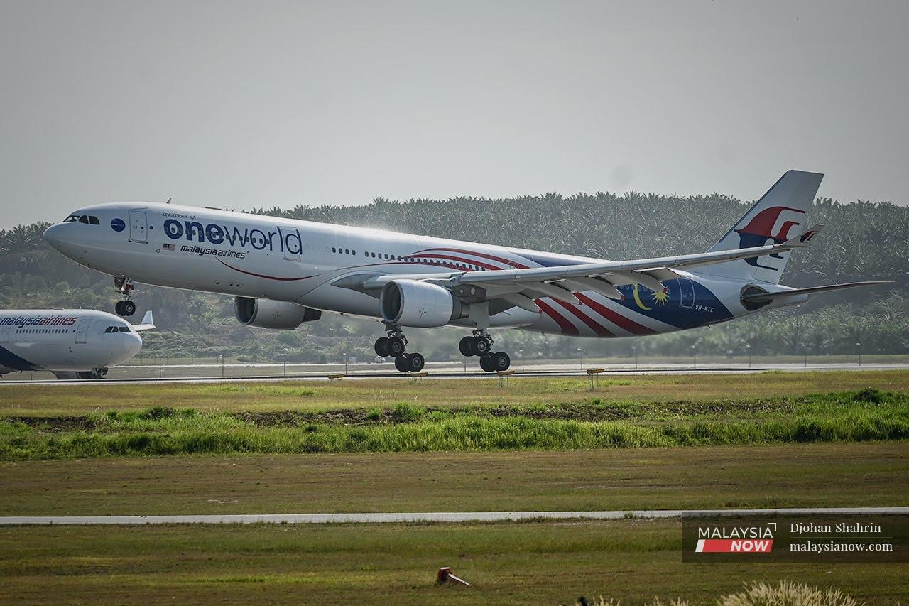 A Malaysia Airlines plane lands at KLIA today, carrying the first batch of the Pfizer vaccine.