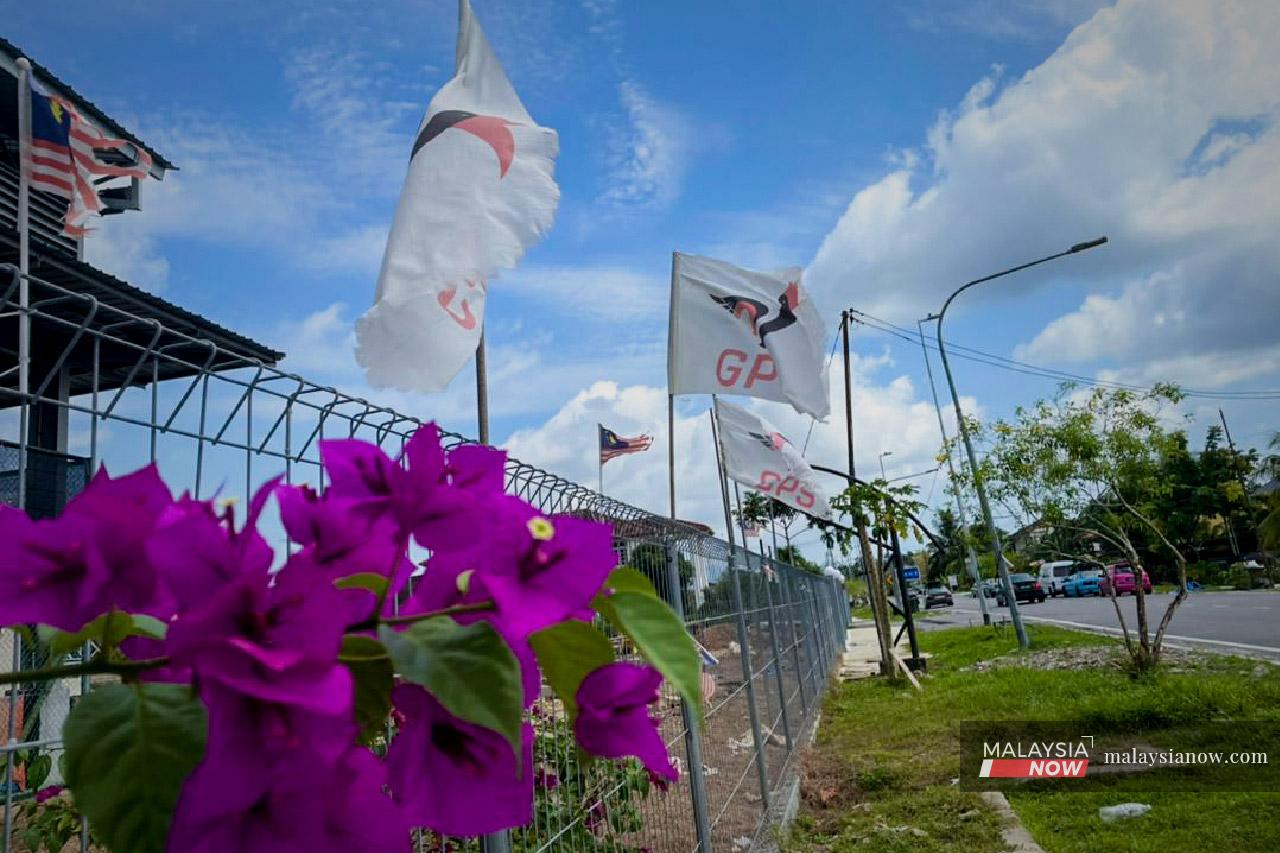 GPS flags flutter in the breeze in Satok, in Kuching, Sarawak. The ruling coalition is widely expected to maintain its hold in the next state polls.
