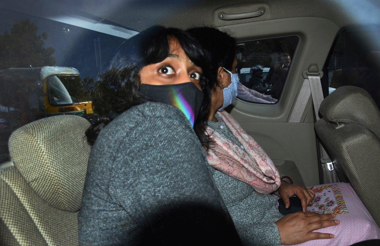 Climate activist Disha Ravi being taken to a court in New Delhi, India, Feb 22. Disha was arrested for circulating a document on social media supporting months of massive protests by farmers in India. Photo: AP