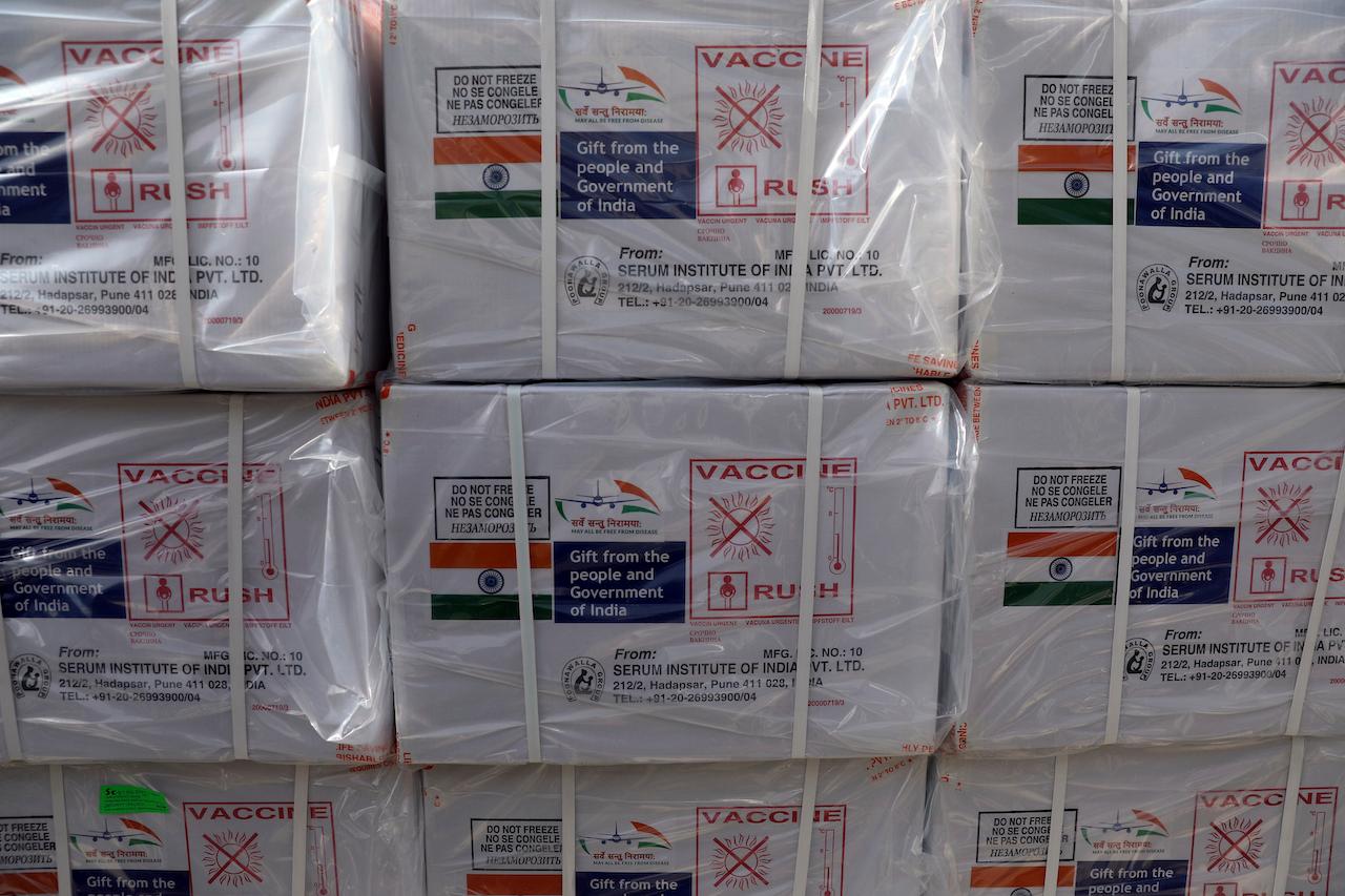 Boxes of the first shipment of 500,000 doses of the AstraZeneca vaccine made by Serum Institute of India await distribution at the Hamid Karzai International Airport in Kabul, Afghanistan, Feb 7. Ghana has become the first country in the world to receive vaccines acquired through the UN-backed Covax initiative with a delivery of 600,000 doses of the AstraZeneca vaccine. Photo: AP