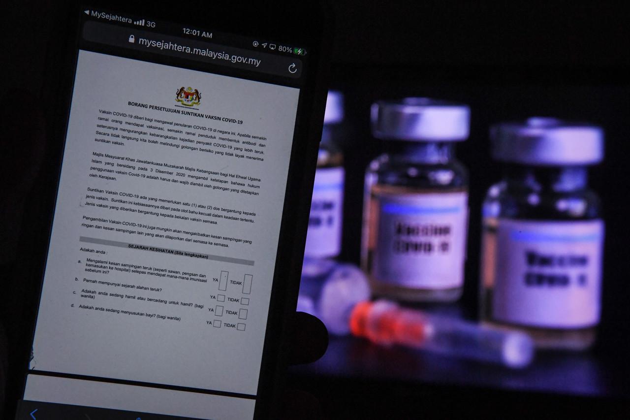 The MySejahtera app is one of five methods of registering for the Covid-19 vaccination programme that will be available to the public. Photo: Bernama