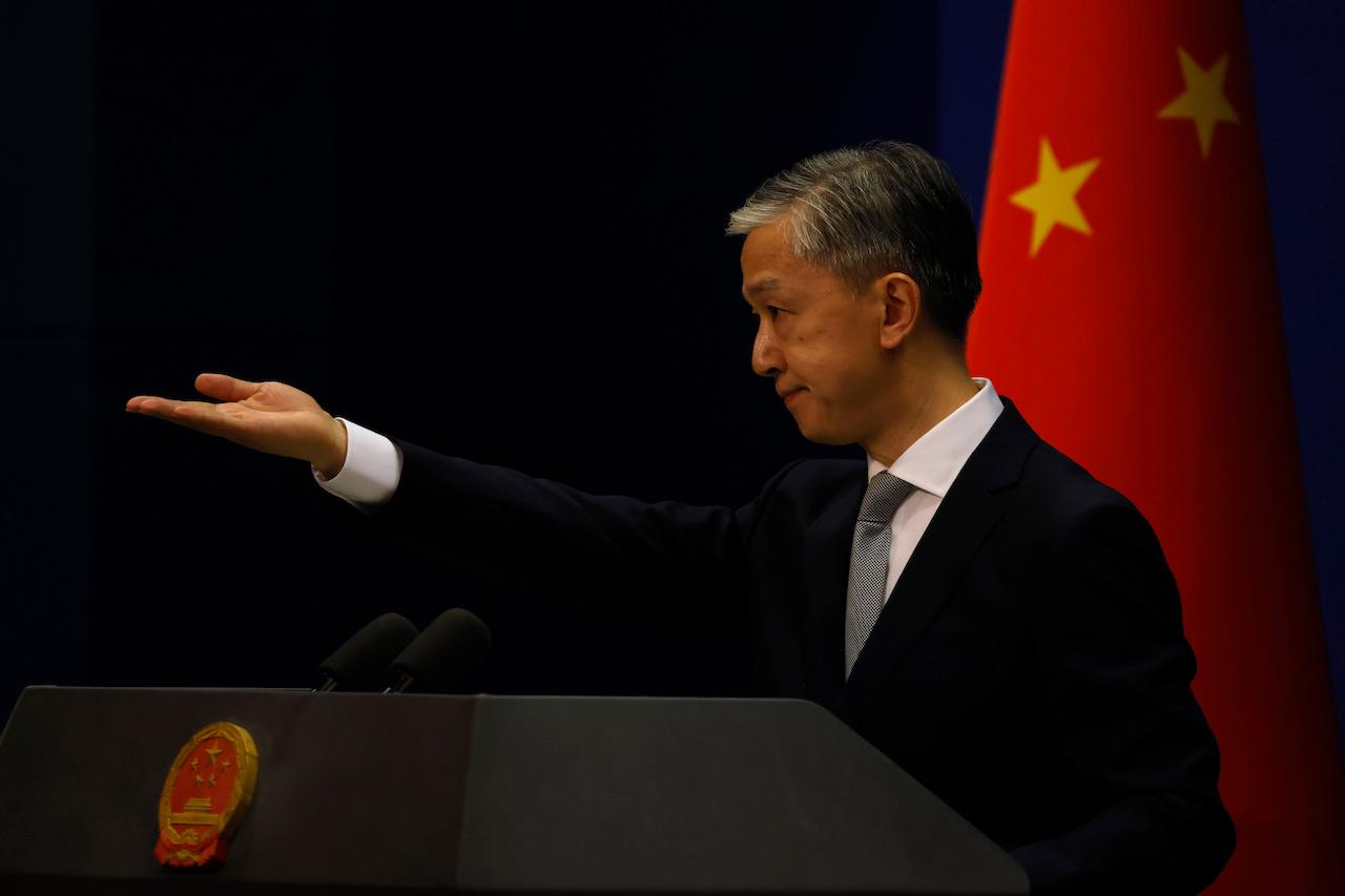 China's foreign ministry spokesman Wang Wenbin gestures for questions during a daily briefing in Beijing in this file photo dated July 23, 2020. Wang on Wednesday sought to highlight what he called Britain's 'double standards' on human rights issues. Photo: AP
