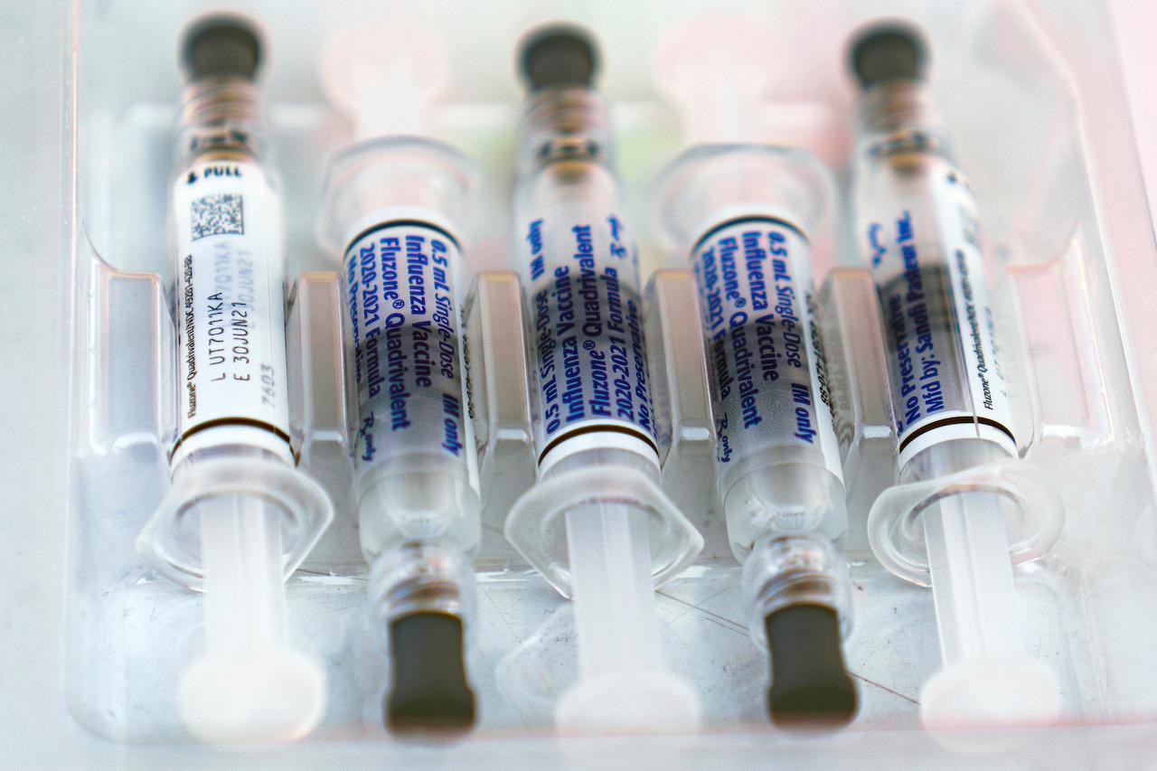 Syringes of flu vaccine arranged in a clinic in California. This is the lowest flu season on record, say doctors in the US. Photo: AP