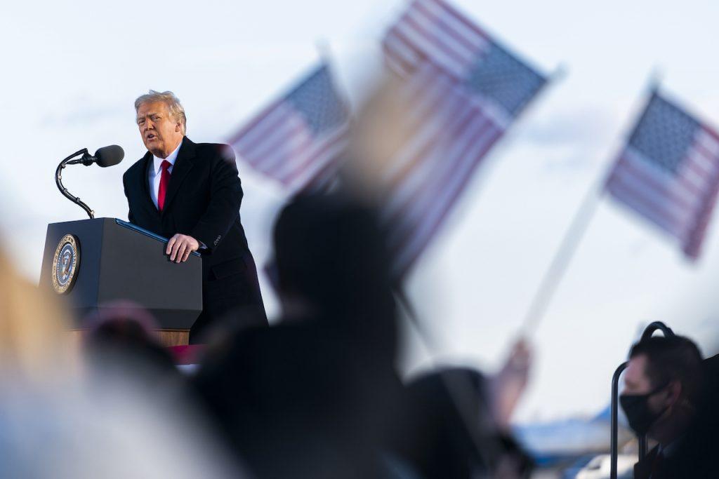 Former US president Donald Trump speaks at Andrews Air Force Base in this file photo taken Jan 20. Trump says any talk of him beginning a new political party is 'fake news'. Photo: AP