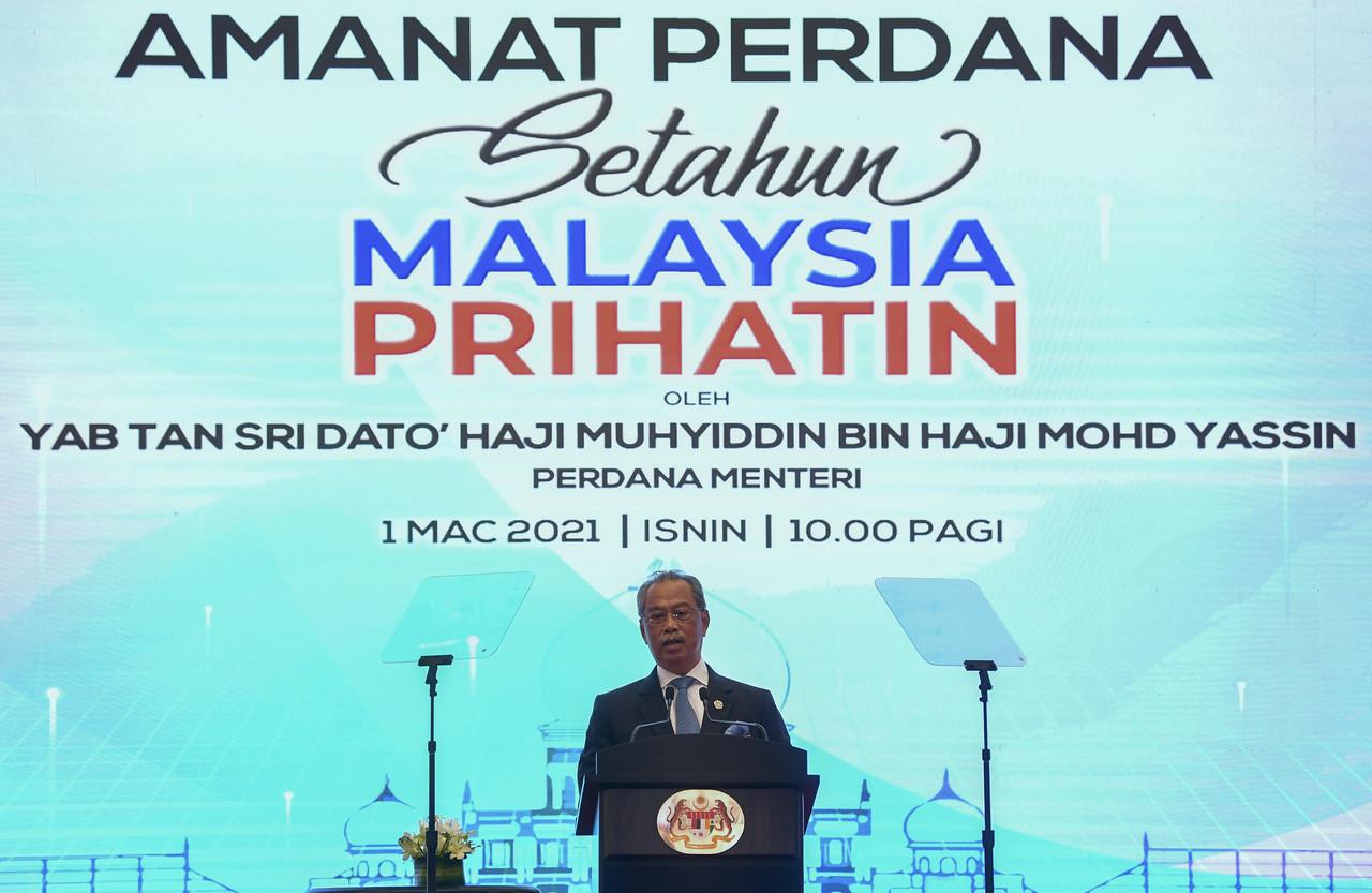 Prime Minister Muhyiddin Yassin speaks at the Putrajaya International Convention Centre today in conjunction with Perikatan Nasional's first year in government. Photo: Bernama