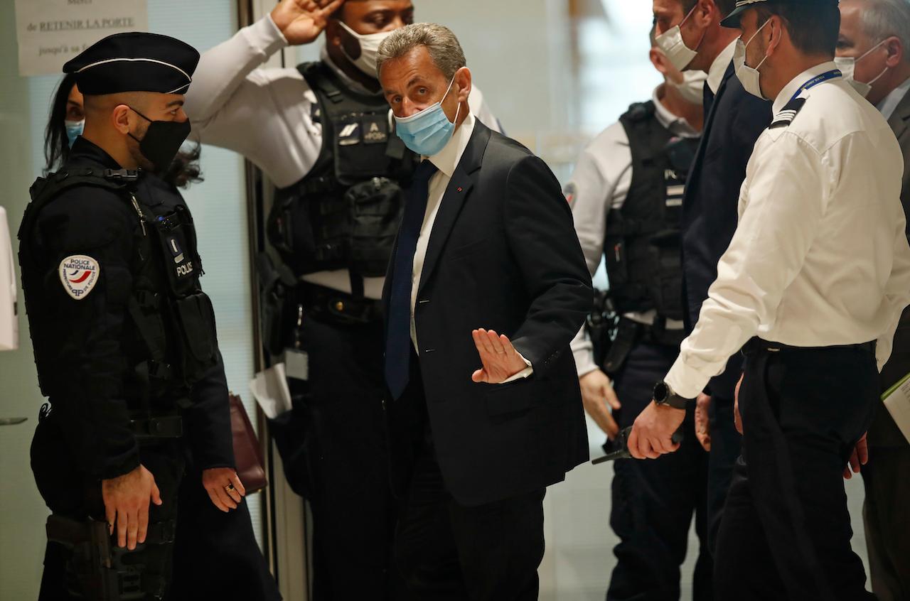Former French president Nicolas Sarkozy arrives at the courtroom in Paris, March 1. A Paris court found Sarkozy guilty of corruption and influence peddling and sentenced him to one year in prison and a two-year suspended sentence. Photo: AP