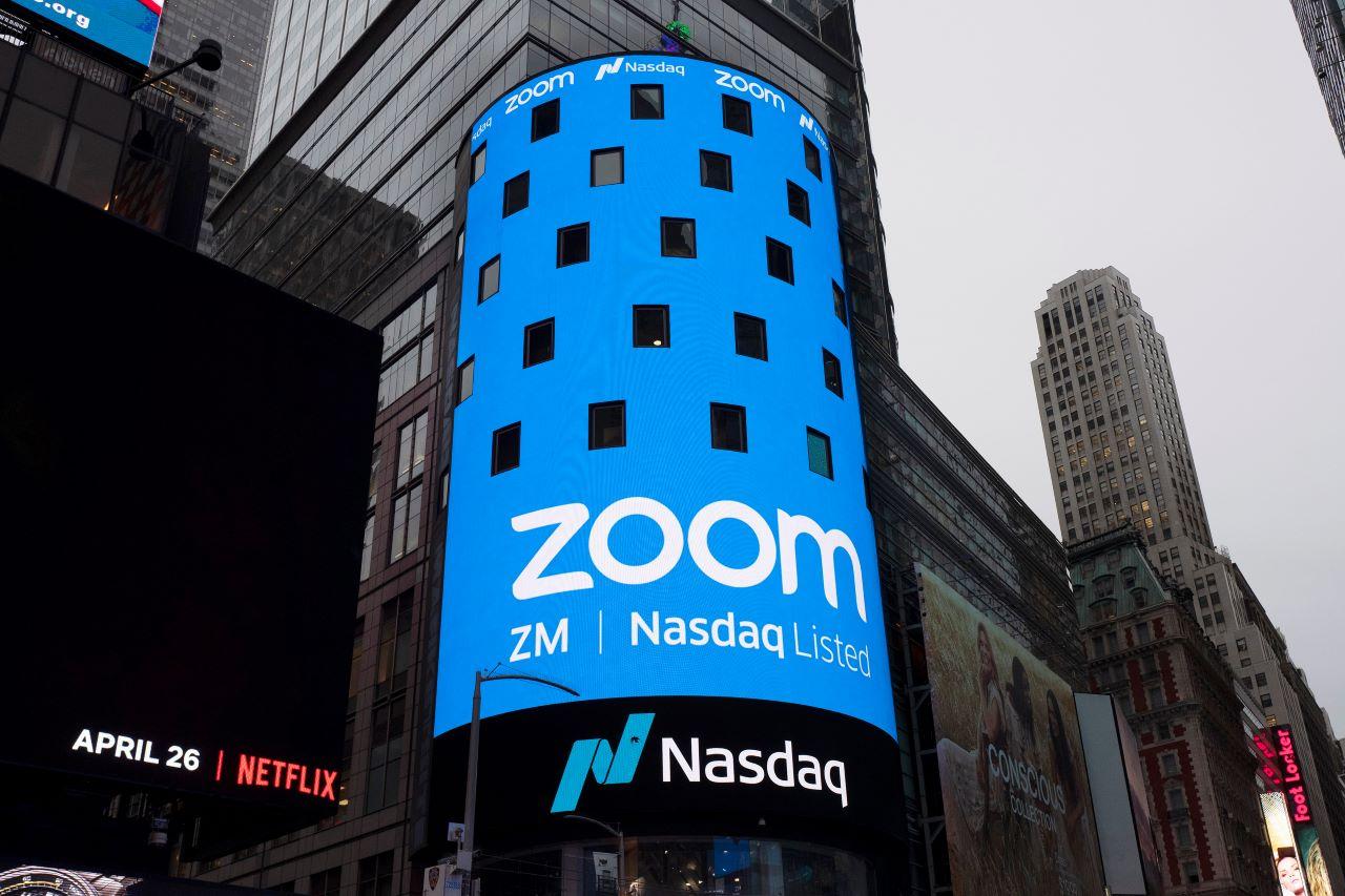 The photo shows a sign for Zoom Video Communications ahead of the company's Nasdaq IPO in New York. Zoom’s astronomical growth is tapering off along with the pandemic, a deceleration that has emerged in an otherwise impressive quarterly earnings report released March 1. Photo: AP