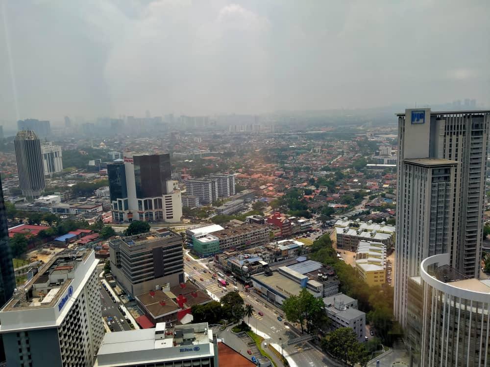 Haze obscures the horizon in Petaling Jaya, one of several areas in Selangor which recorded unhealthy air pollutant index readings this morning.