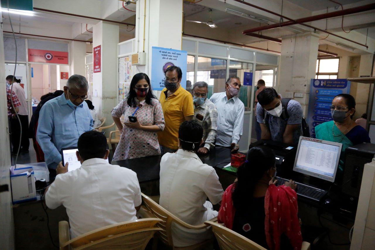 People register to receive the Covid-19 vaccine at Sola Civil hospital in Ahmedabad, India, March 3. Some 15 million shots have been administered so far in India's vaccination programme. Photo: AP