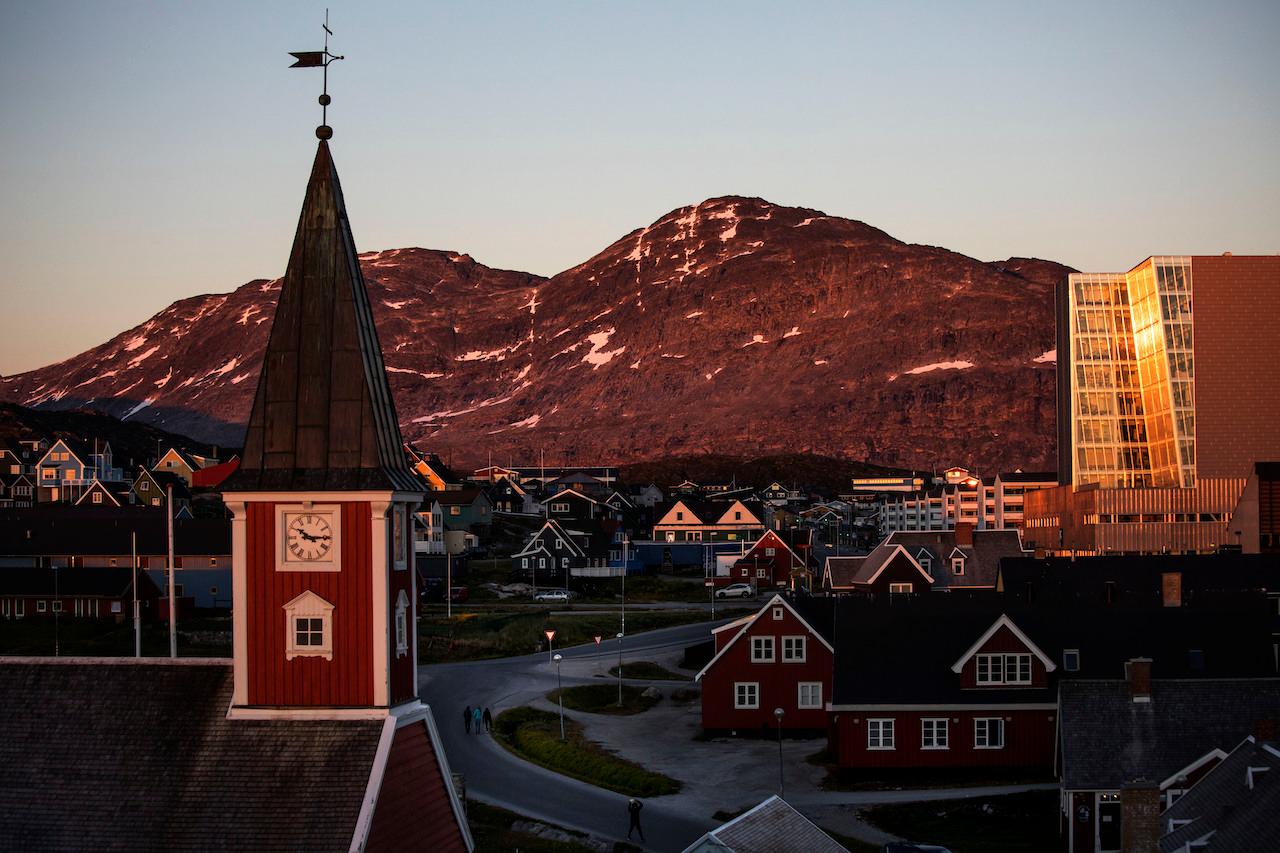 The sun sets over Nuuk, Greenland, July 31, 2017. Greenland has huge deposits of rare earths, which are a set of 17 vital minerals used in a huge number of modern applications. Photo: AP