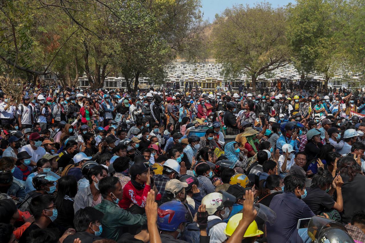 Hundreds of people gather for the burial of Kyal Sin in Mandalay, Myanmar, March 4. Kyal Sin was shot in the head by Myanmar security forces during an anti-coup protest rally she was attending. Photo: AP