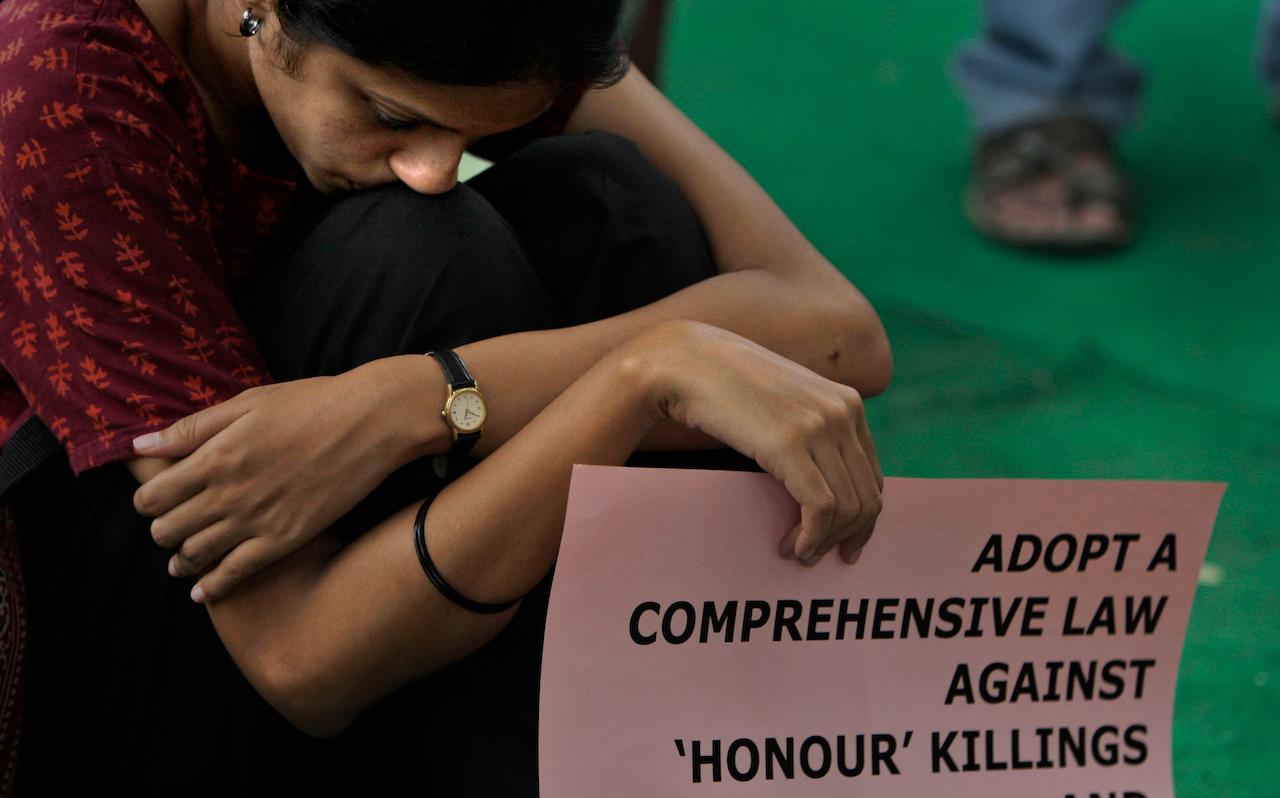 An activist from an NGO participates in a sit-in demonstration against honour killings in Delhi and other parts of the country, in New Delhi, India, in this file photo taken on June 25, 2010. In India, hundreds of women are killed each year for falling in love or marrying against their families' wishes. Photo: AP
