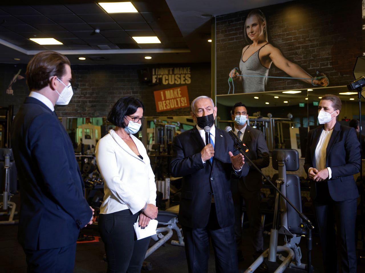 Israeli Prime Minister Benjamin Netanyahu (centre) visits a fitness gym with Austrian Chancellor Sebastian Kurz (left) and Danish Prime Minister Mette Frederiksen (right) to observe how the Green Pass for citizens vaccinated against Covid-19 is used, in Modi'in, Israel, March 4. Photo: AP