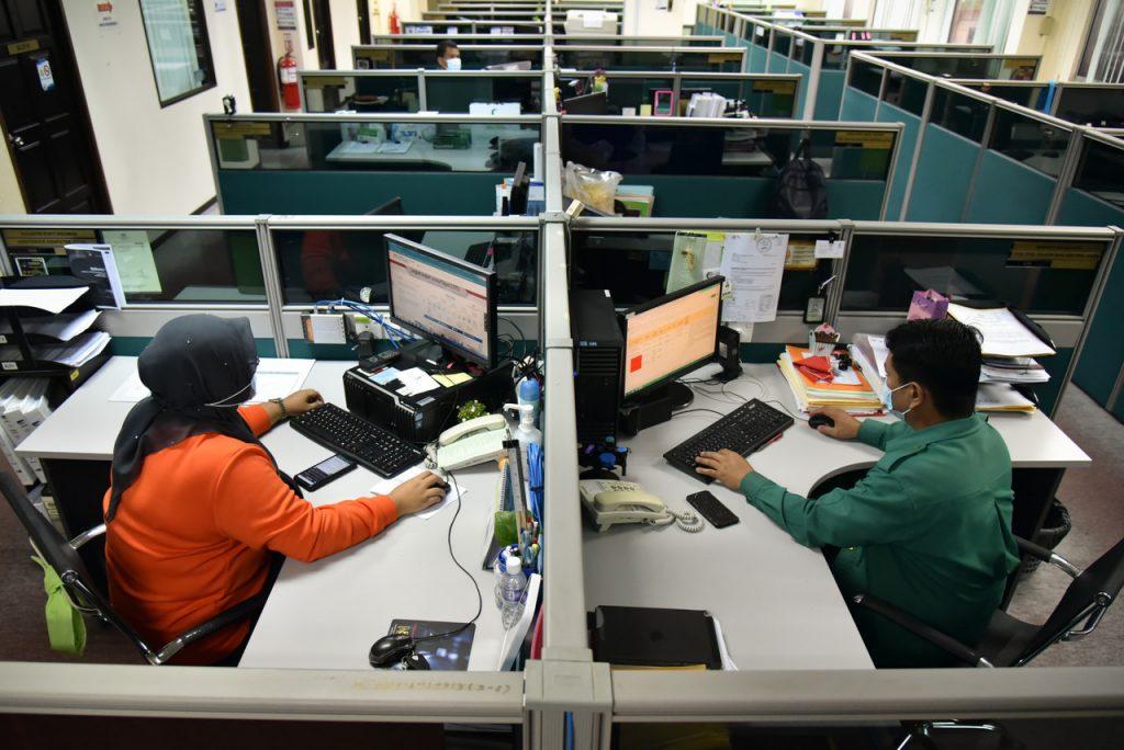 The government is considering extending the work from home arrangement under certain circumstances for employees from both the public and private sector. Photo: Bernama