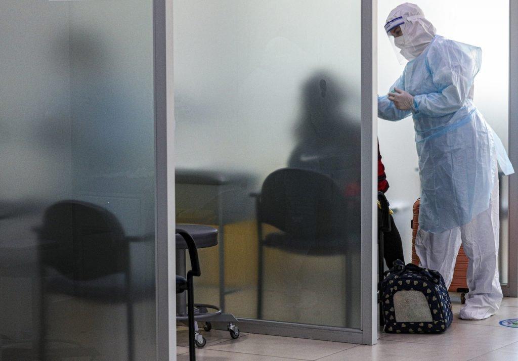 A health worker screens a woman for Covid-19 at a centre in Chile. US regulators authorised Eli Lilly's combination therapy in February and Europe gave it the go-ahead in March. Photo: AP