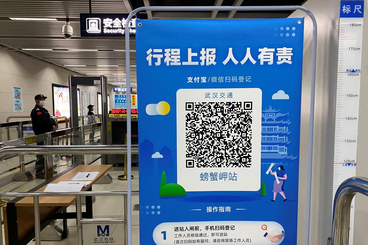 In this April 1, 2020, photo, a QR code is set up for passengers to check their green pass status at a subway station in Wuhan in central China's Hubei province. Life in China post-coronavirus outbreak is ruled by a green symbol on a smartphone screen. Green signifies the 'health code' that says the user is symptom-free. Photo: AP