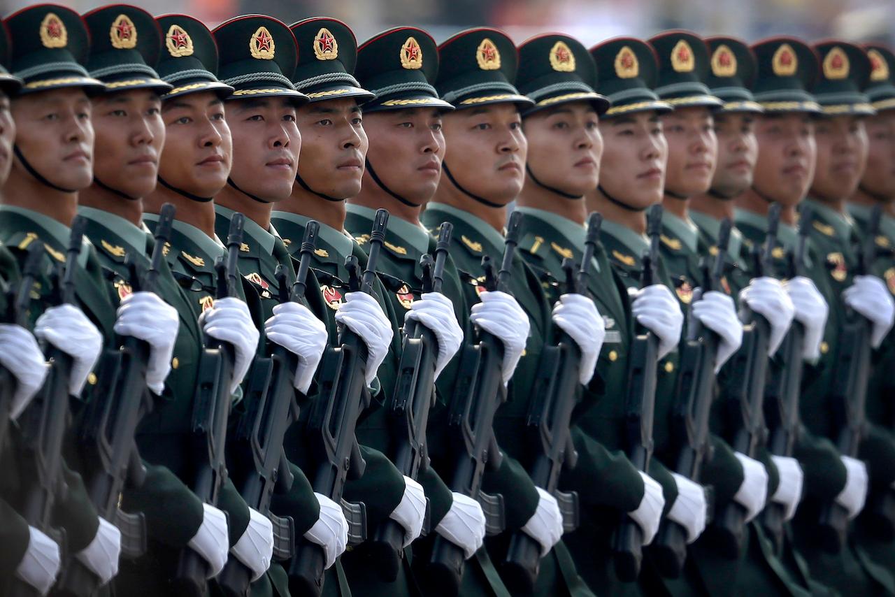 In this Oct 1, 2019, photo, Chinese People's Liberation Army soldiers march in formation during a parade to commemorate the 70th anniversary of the founding of the People's Republic of China in Beijing. Top US military brass are warning that China could in the next few years invade Taiwan given its rapid military build-up. Photo: AP