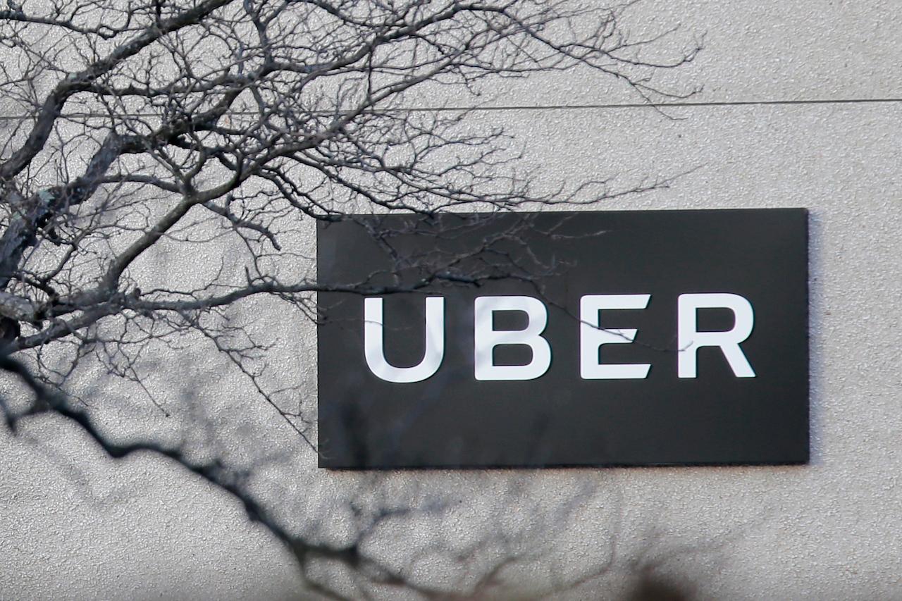 Uber is giving its UK drivers minimum wage, pensions and holiday pay, following a recent court ruling that said they should be classified as workers and entitled to such benefits, the company announced March 16. Photo: AP