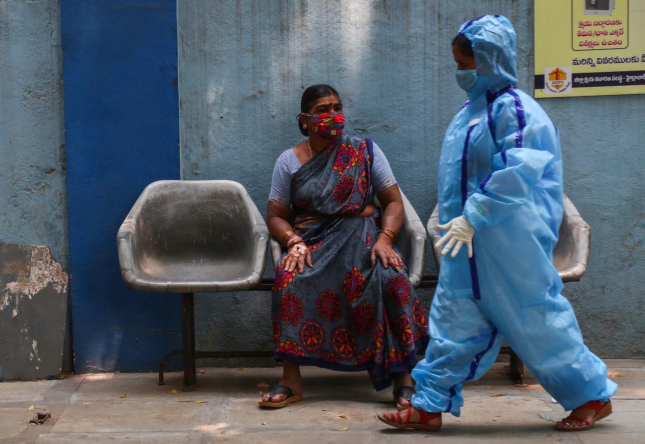 A woman in Hyderabad, India, waits to be tested for Covid-19. India’s cases jumped by 28,903 on Wednesday, the highest increase since Dec 13 last year. Photo: AP