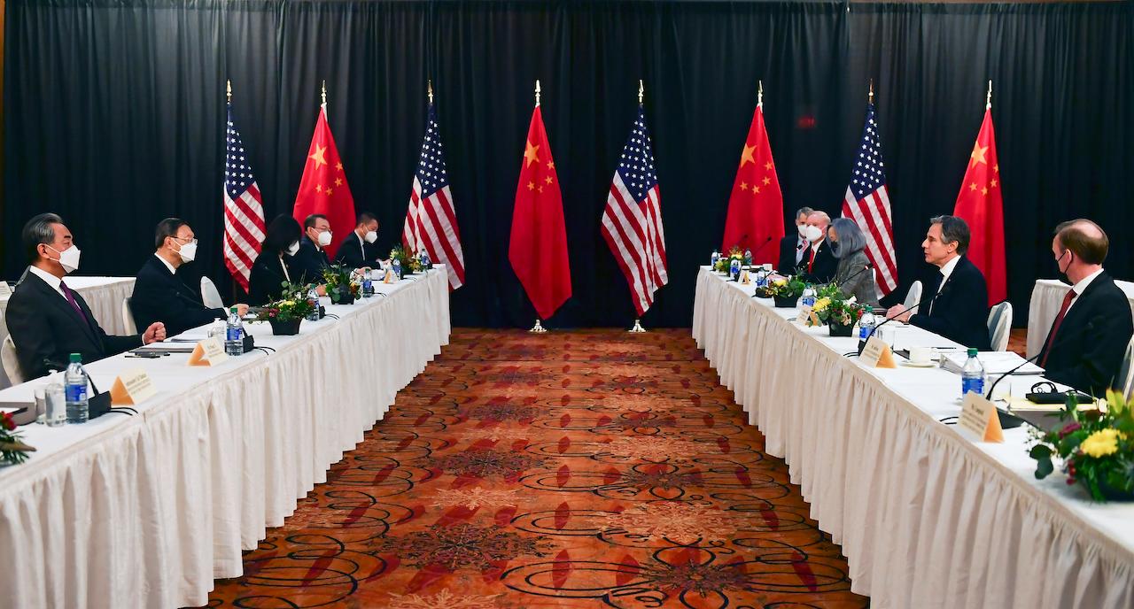 Secretary of State Antony Blinken (second from right) joined by national security adviser Jake Sullivan (right) speaks while facing Chinese Communist Party foreign affairs chief Yang Jiechi (second from left) and China's State Councilor Wang Yi (left) at the opening session of US-China talks at the Captain Cook Hotel in Anchorage, Alaska, March 18. Photo: AP