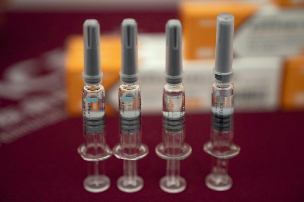 Syringes of vaccine for Covid-19 produced by Sinovac displayed during a media tour of its factory in Beijing. Photo: AP