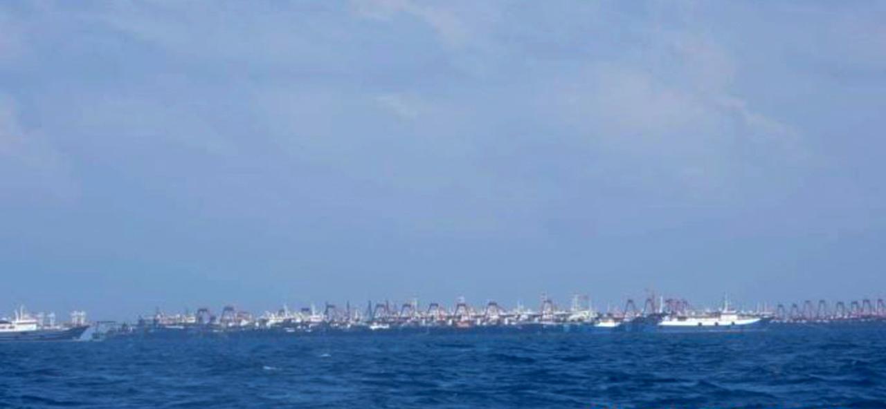 Some of several hundred Chinese vessels are seen moored at Whitsun Reef, South China Sea on March 7. The Philippine government has expressed concern after spotting more than 200 Chinese fishing vessels it believes are crewed by militias at a reef claimed by both countries in the South China Sea. Photo: AP