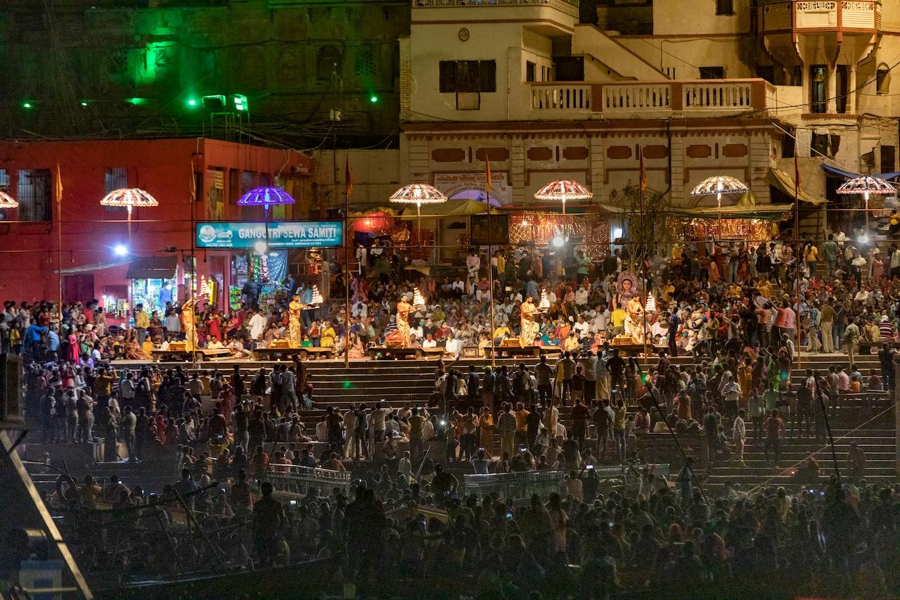 Tourists watch Hindu priests perform evening rituals on the banks of the River Ganges in Varanasi, India, March 14. Varanasi is among the world's oldest cities, and millions of Hindu pilgrims gather annually here for ritual bathing and prayers in the Ganges River, considered holiest by Hindus. Photo: AP