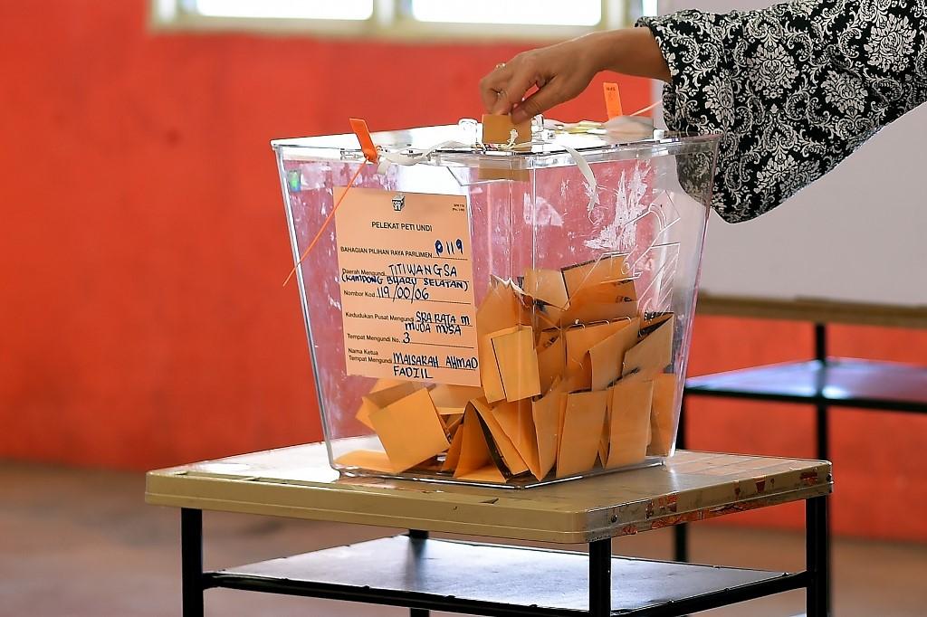 The Constitution (Amendment) Bill 2019 allowed automatic voter registration and lowered the minimum voting age to 18. Photo: AFP