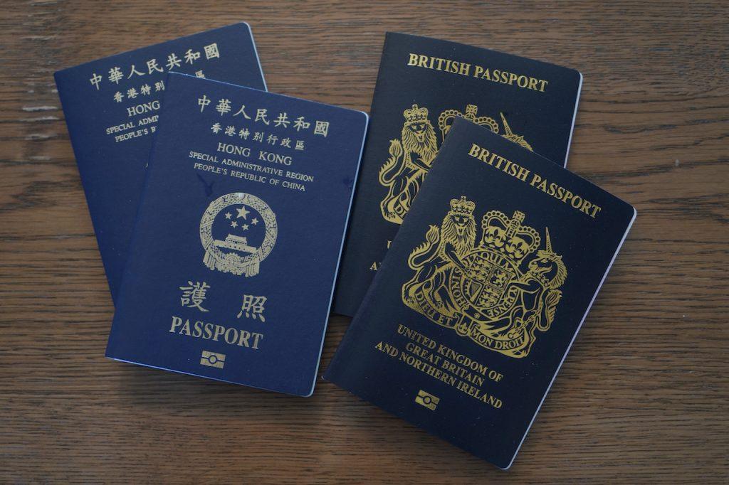 British National Overseas passports and Hong Kong passports displayed together. The Hong Kong government has informed 14 foreign consulates that it no longer considers the former a valid travel document. Photo: AP