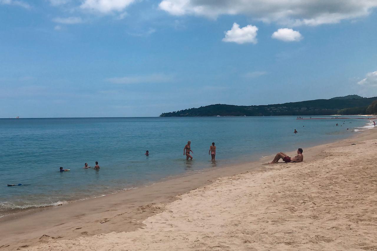 Tourists lounge on a beach in Phuket, Thailand, in this March 26, 2020 photo. Some 40 million tourists were expected to arrive in Thailand in 2020, but only 6.7 million managed to enter. Photo: AP