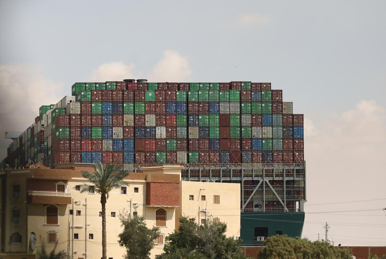 Panama-flagged cargo ship Ever Given has been wedged across the Suez Canal, blocking traffic in the vital waterway since Tuesday. At present, more than 200 ships are stuck, with several billion dollars worth of goods on board. Photo: AP