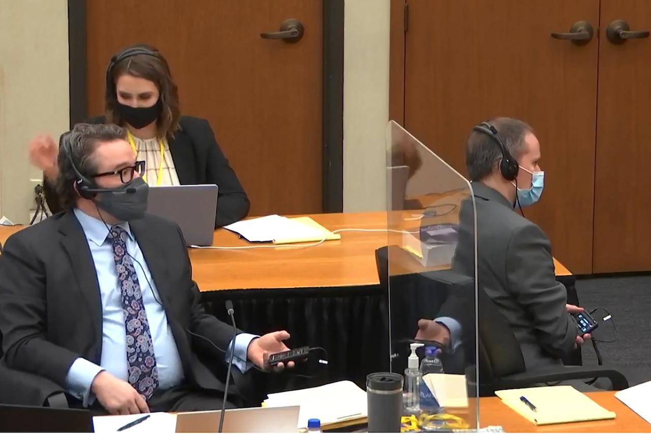 In this image from video, defence attorney Eric Nelson (left), Nelson's assistant Amy Voss (back), and former Minneapolis police officer Derek Chauvin (right), participate in a sidebar through headsets with Hennepin county judge Peter Cahill as he presides March 29 in the trial of Chauvin, in the May 25, 2020, death of George Floyd. Photo: AP