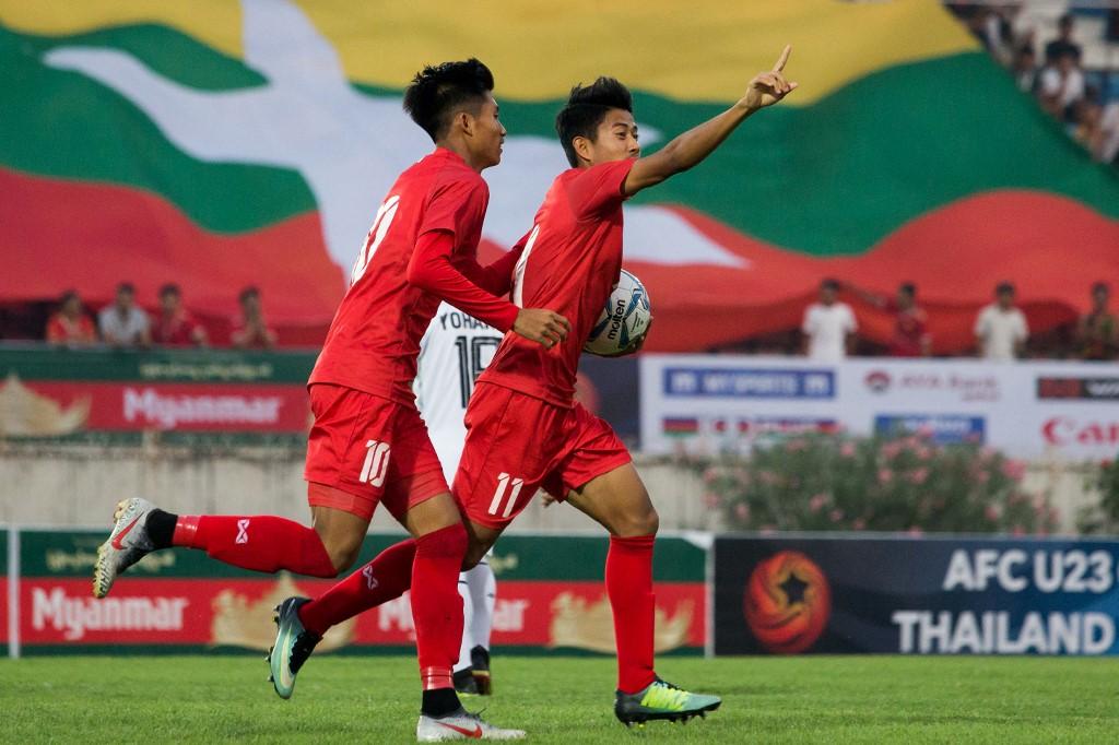 Myanmar's Hein Htet Aung (right), seen in action with the national side in 2019, currently plays for Malaysian second-division side Selangor FC II. Photo: AFP