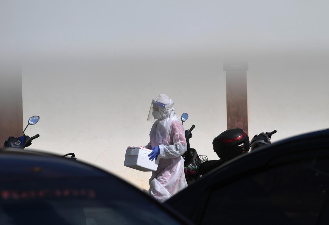 A health worker participates in a Covid-19 screening at Klinik Kesihatan Indera Mahkota in Kuantan, Pahang. Photo: Bernama