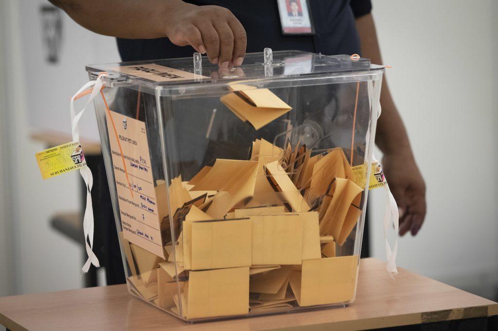 The Election Commission had said that automatic voter registration and the lowering of voting age to 18 could only be implemented after Sept 1, 2022. Photo: AP