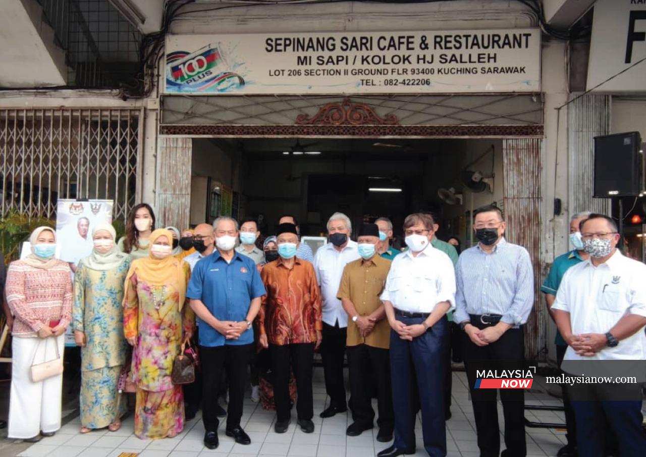 Prime Minister Muhyiddin Yassin, Sarawak Chief Minister Abang Johari Openg and other state leaders at Sepinang Sari Cafe in Kuching today.