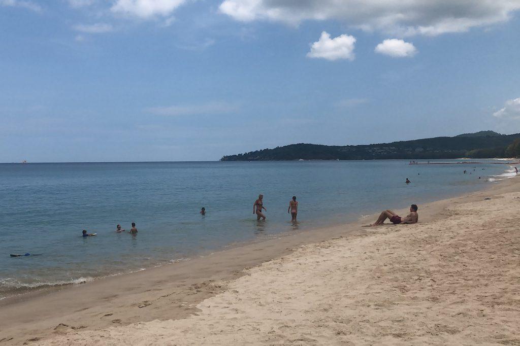 Tourists lounge on a beach in Phuket, Thailand, in this March 26, 2020 photo. Phuket aims to vaccinate most of its population of 460,000 as it gears up for July 1, when vaccinated overseas visitors will no longer be required to quarantine. Photo: AP