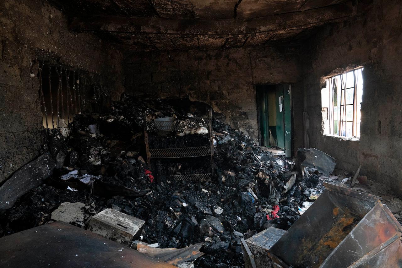 Burned documents seen inside a correctional facility in Owerri, Nigeria, April 5. Hundreds of inmates escaped from the prison in southeastern Nigeria after a series of coordinated attacks, according to government officials. Photo: AP