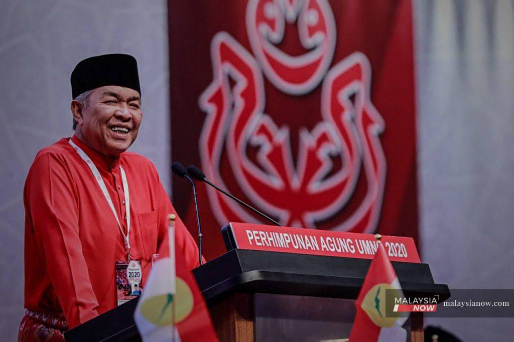 Umno president Ahmad Zahid Hamidi at the party's general assembly where delegates moved to support the motion to cut ties with Bersatu and Perikatan Nasional.