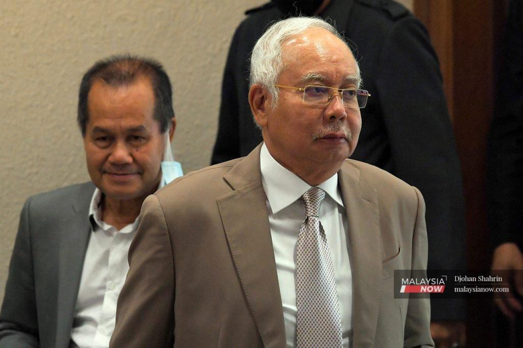 Najib Razak ketika menghadiri perbicaraan mahkamah berhubung skandal SRC International.