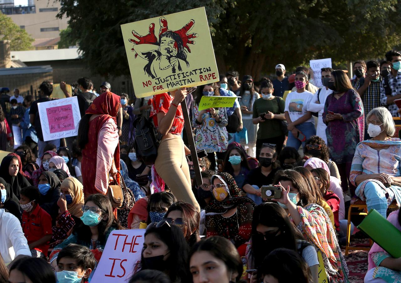 Members of activist group Women Democratic Front participate in a rally to mark International Women's Day in Karachi, Pakistan, March 8. Pakistan Prime Minister Imran Khan has come under fire over recent remarks blaming the way women dress for a rise in rape cases. Photo: AP