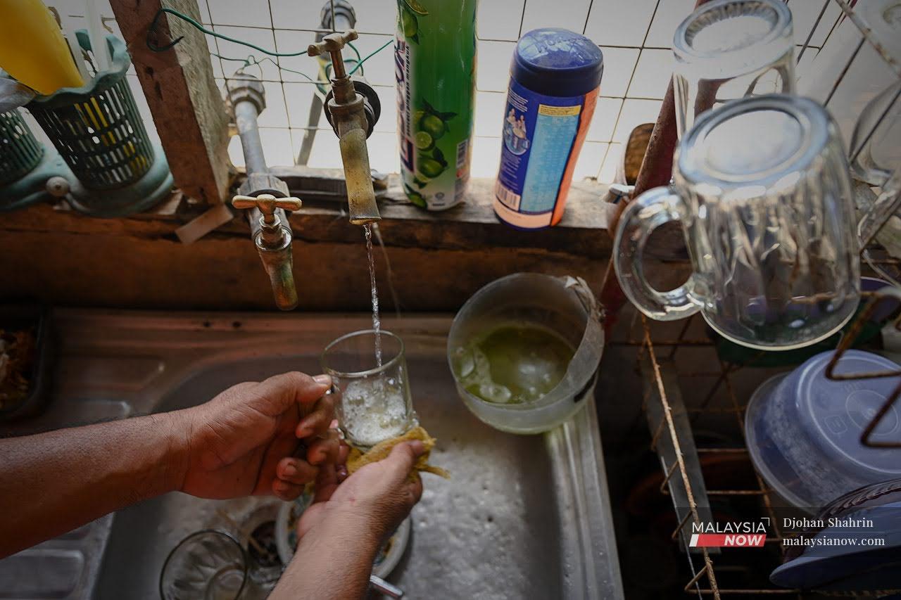 Frequent water disruptions at villages in the interior of Baling, Kedah, mean villagers must rely on alternative sources including a secondary tap installed in their homes linked to makeshift pipines that carry water from nearby rivers.