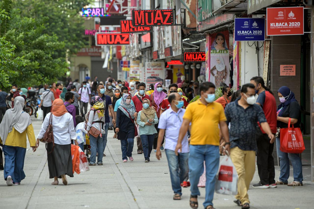 Shoppers stroll along Jalan Tuanku Abdul Rahman in Kuala Lumpur ahead of Ramadan. Kuala Lumpur is among the areas still under conditional movement control order. Photo: Bernama