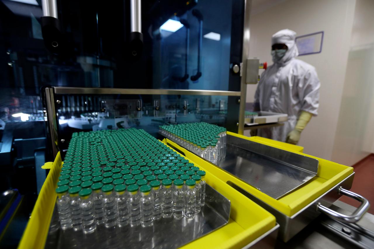 Vials of AstraZeneca's Covishield vaccine for Covid-19 are seen at a filling lab at the Serum Institute of India, Pune, India, Jan 21. Photo: AP