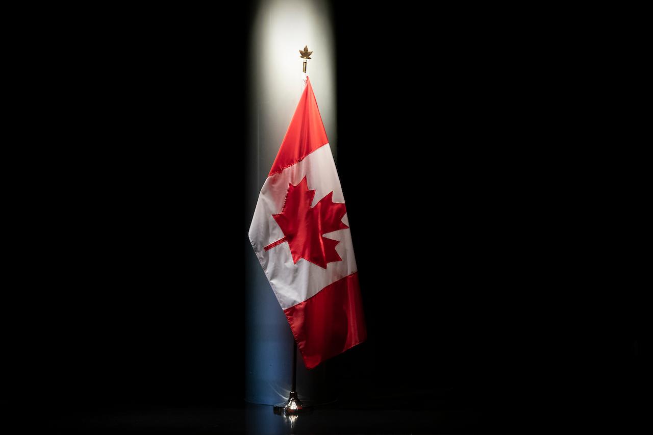 The Canadian flag is illuminated in the embassy of Canada in Washington, June 20, 2019. The Canadian Security Intelligence Service has singled out Russia and China as particular causes for concern in terms of national security threats. Photo: AP